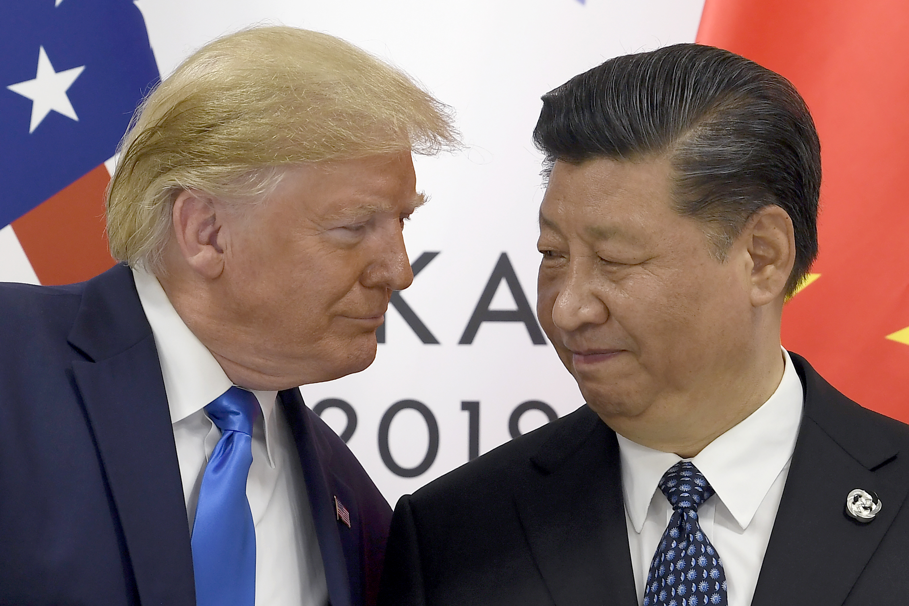 President Donald Trump, left, meets with Chinese President Xi Jinping during a meeting on the sidelines of the G-20 summit in Osaka, Japan, Saturday, June 29, 2019. (AP Photo/Susan Walsh)
