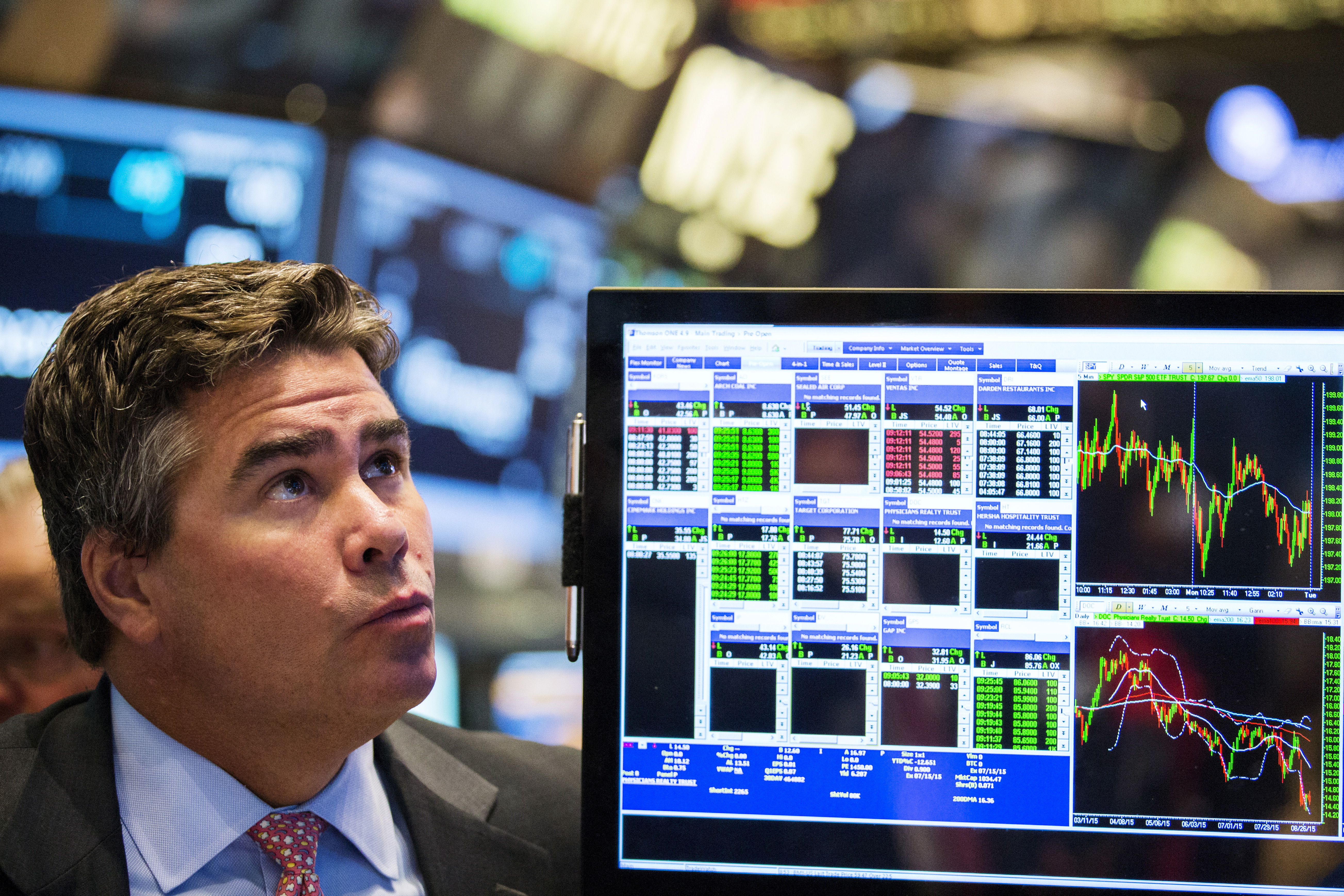 A trader works on the floor of the New York Stock Exchange shortly after the market opened in New York September 1, 2015. Wall Street opened sharply lower on Tuesday after weak data from China heightened fears of a slowdown in the world's second-largest economy and its effect on global growth. REUTERS/Lucas Jackson