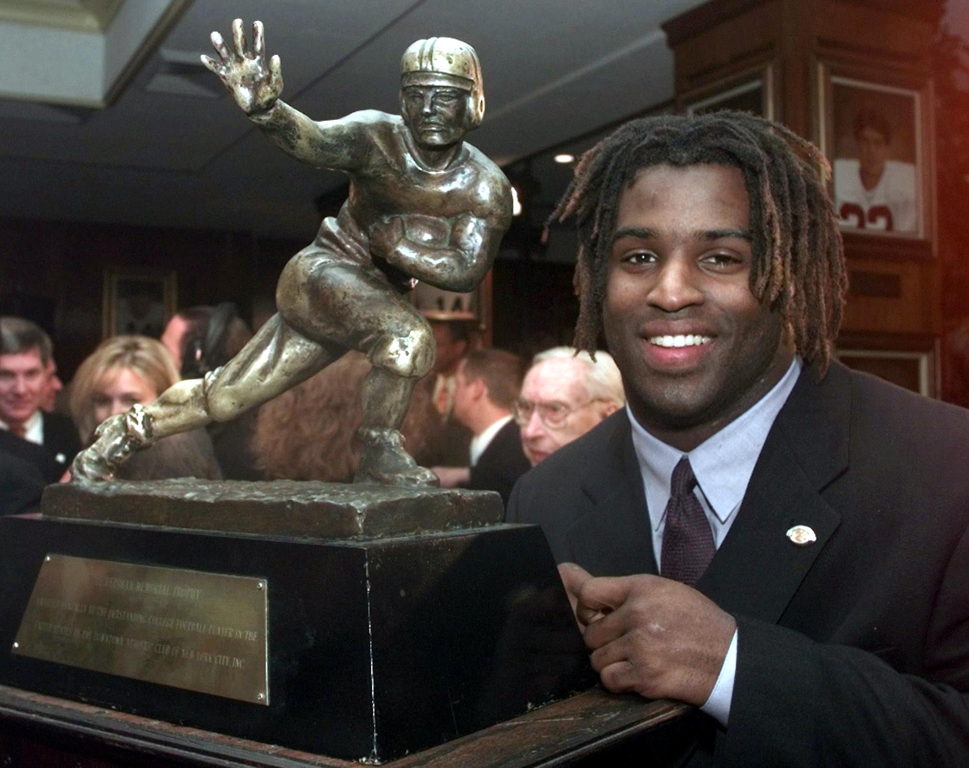 Ricky Williams' Heisman Trophy is sold for record amount - AOL News