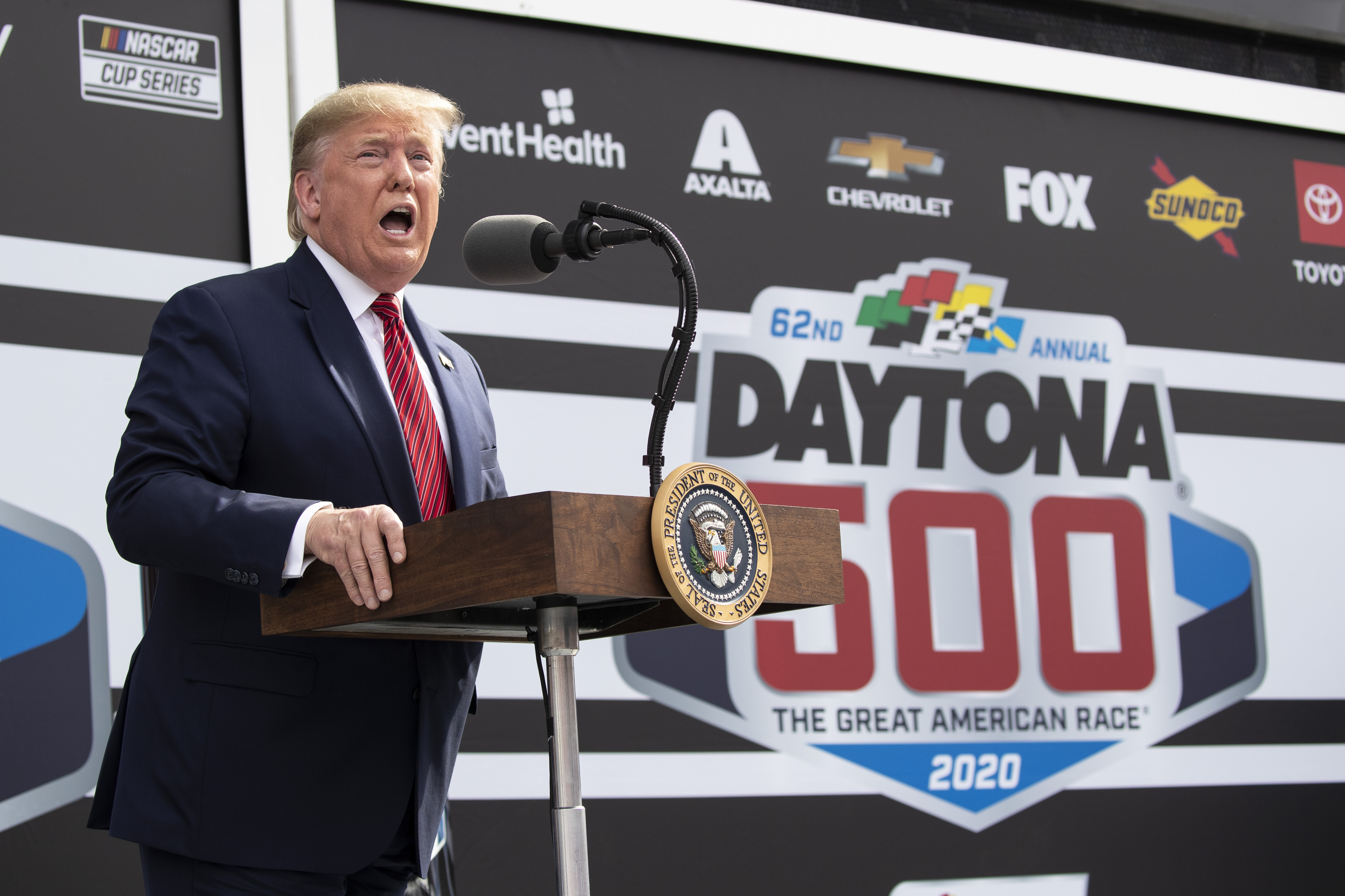 President Donald Trump speaks before the start of the NASCAR Daytona 500 auto race at Daytona International Speedway, Sunday, Feb. 16, 2020, in Daytona Beach, Fla. (AP Photo/Alex Brandon)