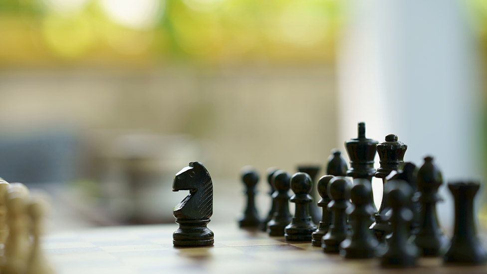 A chess board showing black pieces. Source: Getty Images