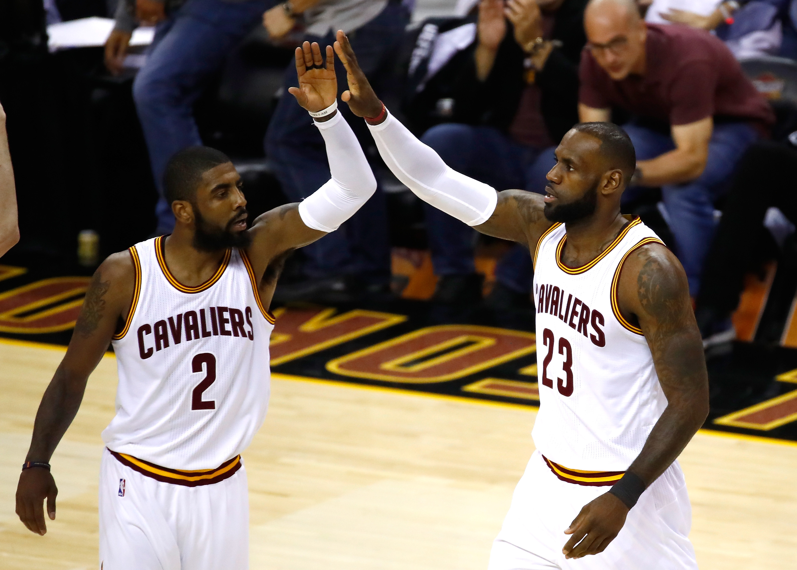 CLEVELAND, OH - JUNE 09: Kyrie Irving #2 and LeBron James #23 of the Cleveland Cavaliers celebrate after a play in the first quarter against the Golden State Warriors in Game 4 of the 2017 NBA Finals at Quicken Loans Arena on June 9, 2017 in Cleveland, Ohio. NOTE TO USER: User expressly acknowledges and agrees that, by downloading and or using this photograph, User is consenting to the terms and conditions of the Getty Images License Agreement.  (Photo by Gregory Shamus/Getty Images)