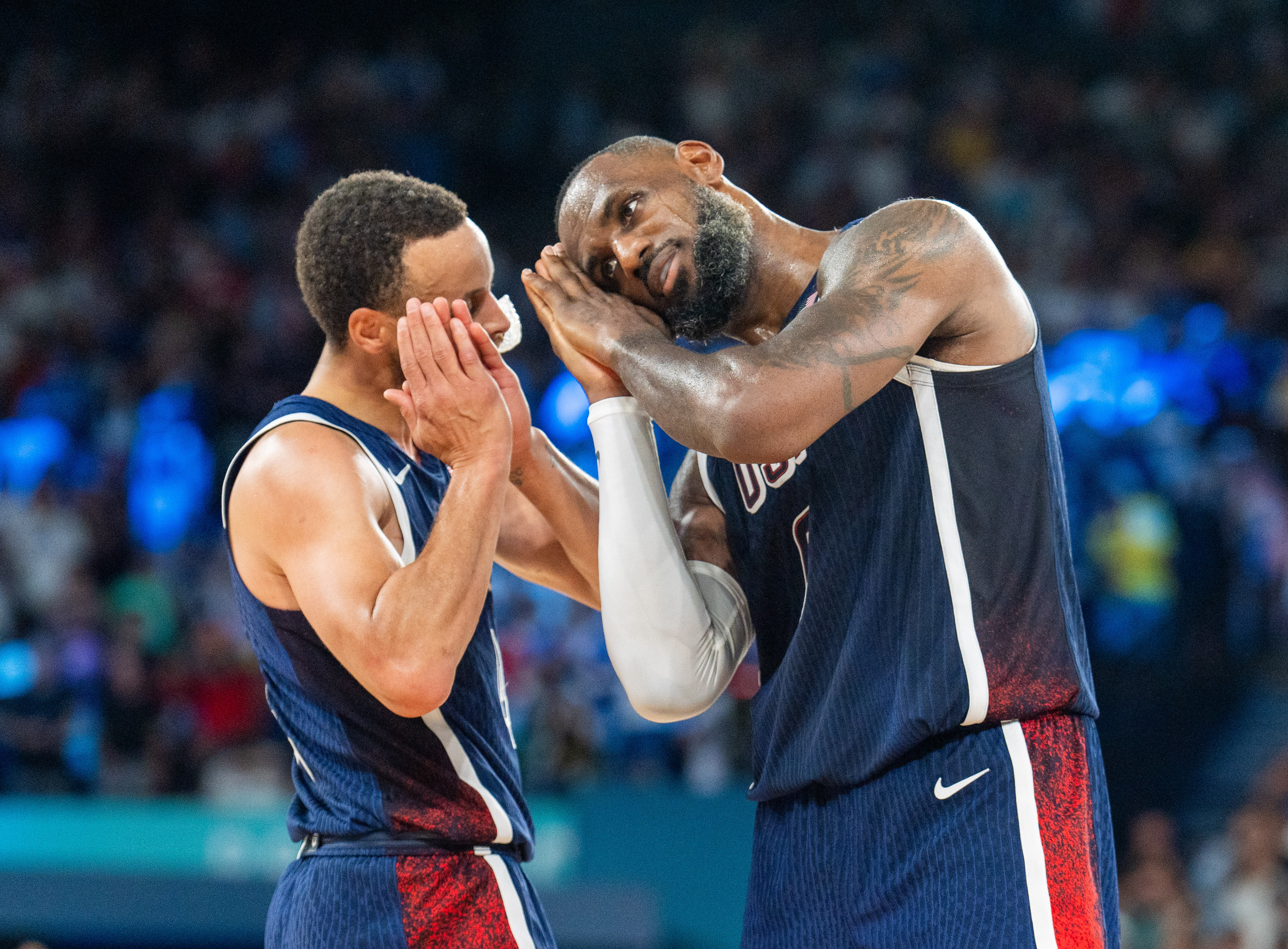 PARIS, FRANCE - AUGUST 10: Players of Team USA celebrate as they win gold medal after defeating France in Men's Gold Medal game on day fifteen of the Olympic Games Paris 2024 at Bercy Arena on August 10, 2024 in Paris, France. (Photo by Aytac Unal/Anadolu via Getty Images)