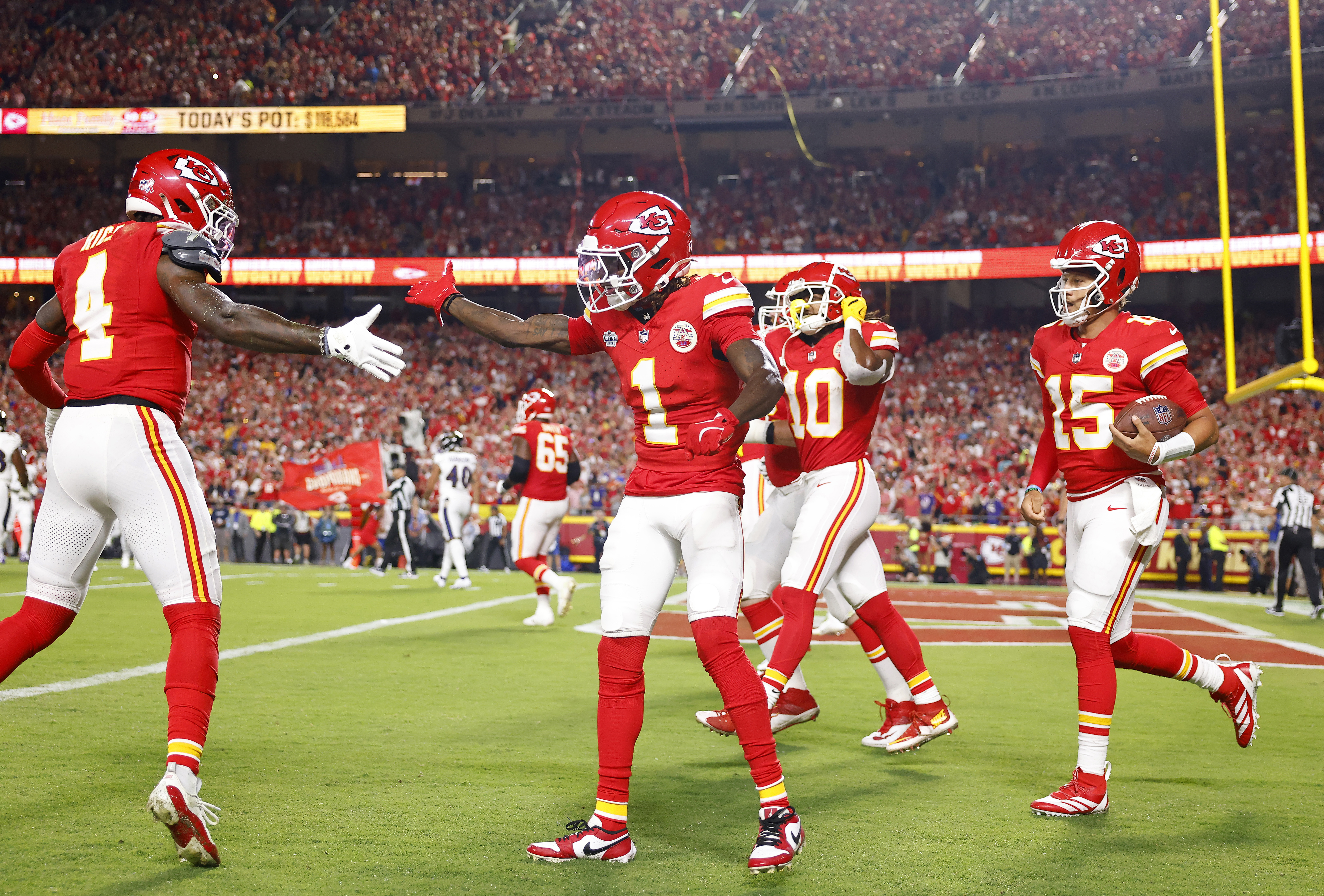 KANSAS CITY, MISSOURI - SEPTEMBER 05: Xavier Worthy #1 of the Kansas City Chiefs celebrates his touchdown with teammate Rashee Rice #4 as they play against the Baltimore Ravens during the first quarter at GEHA Field at Arrowhead Stadium on September 05, 2024 in Kansas City, Missouri. (Photo by David Eulitt/Getty Images)