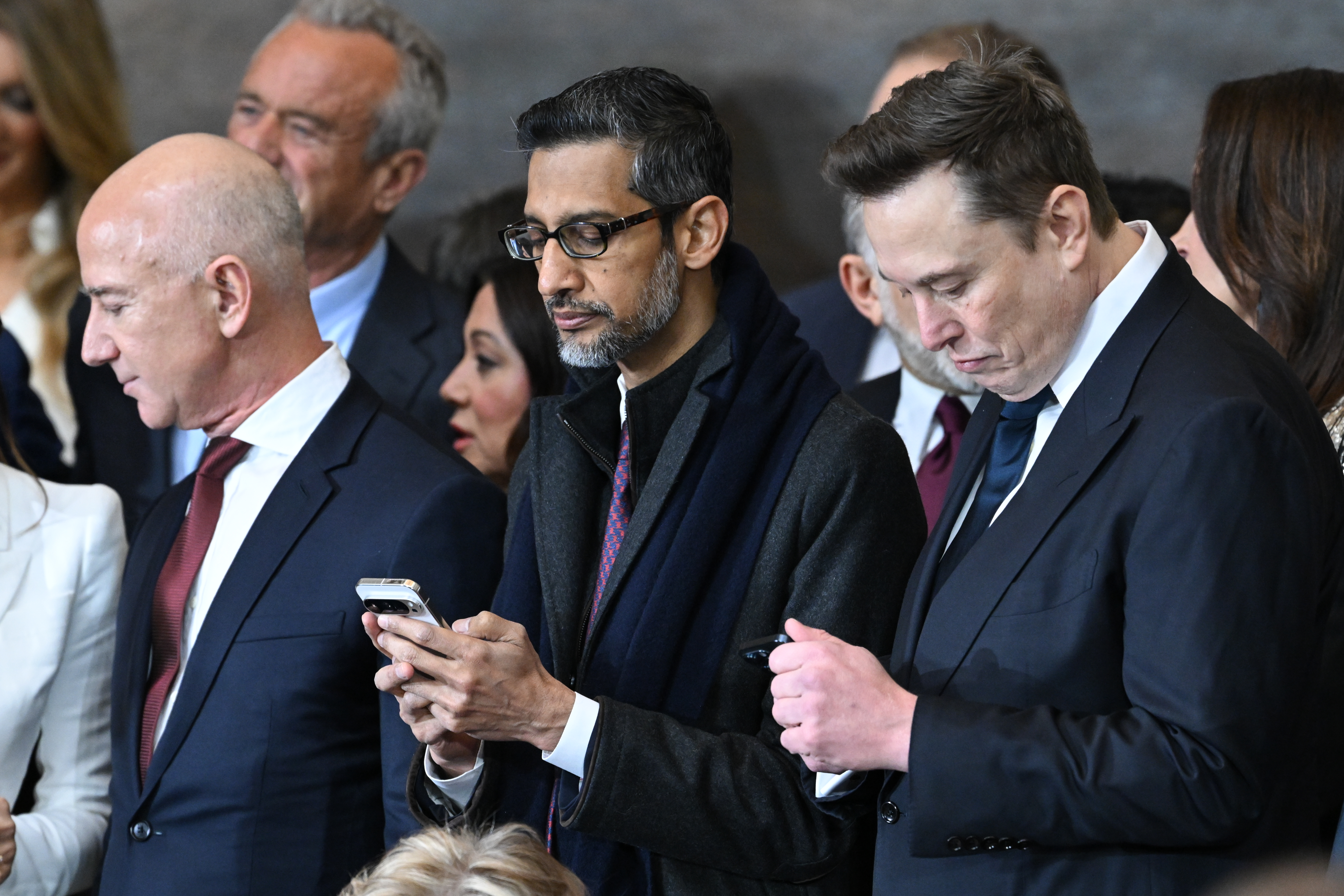 WASHINGTON, DC - JANUARY 20: (L-R) Amazon founder Jeff Bezos, Google CEO Sundar Pichai and Tesla and SpaceX CEO Elon Musk attend the inauguration of Donald Trump in the U.S. Capitol Rotunda on January 20, 2025 in Washington, DC. Donald Trump takes office for his second term as the 47th President of the United States. (Photo by Saul Loeb-Pool/Getty Images)
