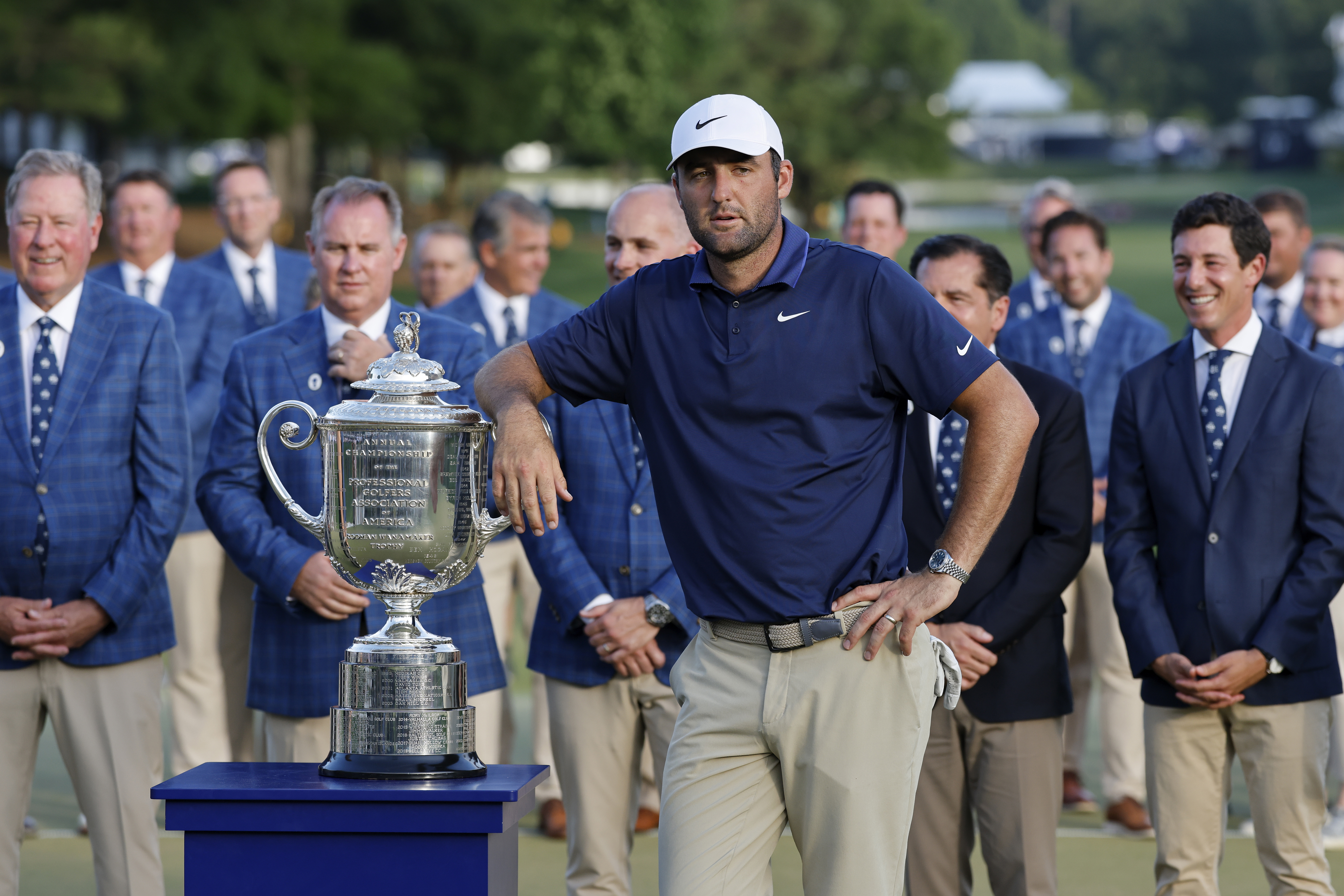 CHARLOTTE, NC - MAY 18: Scottie Scheffler (USA) stands next to the Wanamaker Trophy after his victory during the final round of the PGA Championship on May 18, 2025 at Quail Hollow Country Club in Charlotte, North Carolina. (Photo by Joe Robbins/Icon Sportswire via Getty Images)