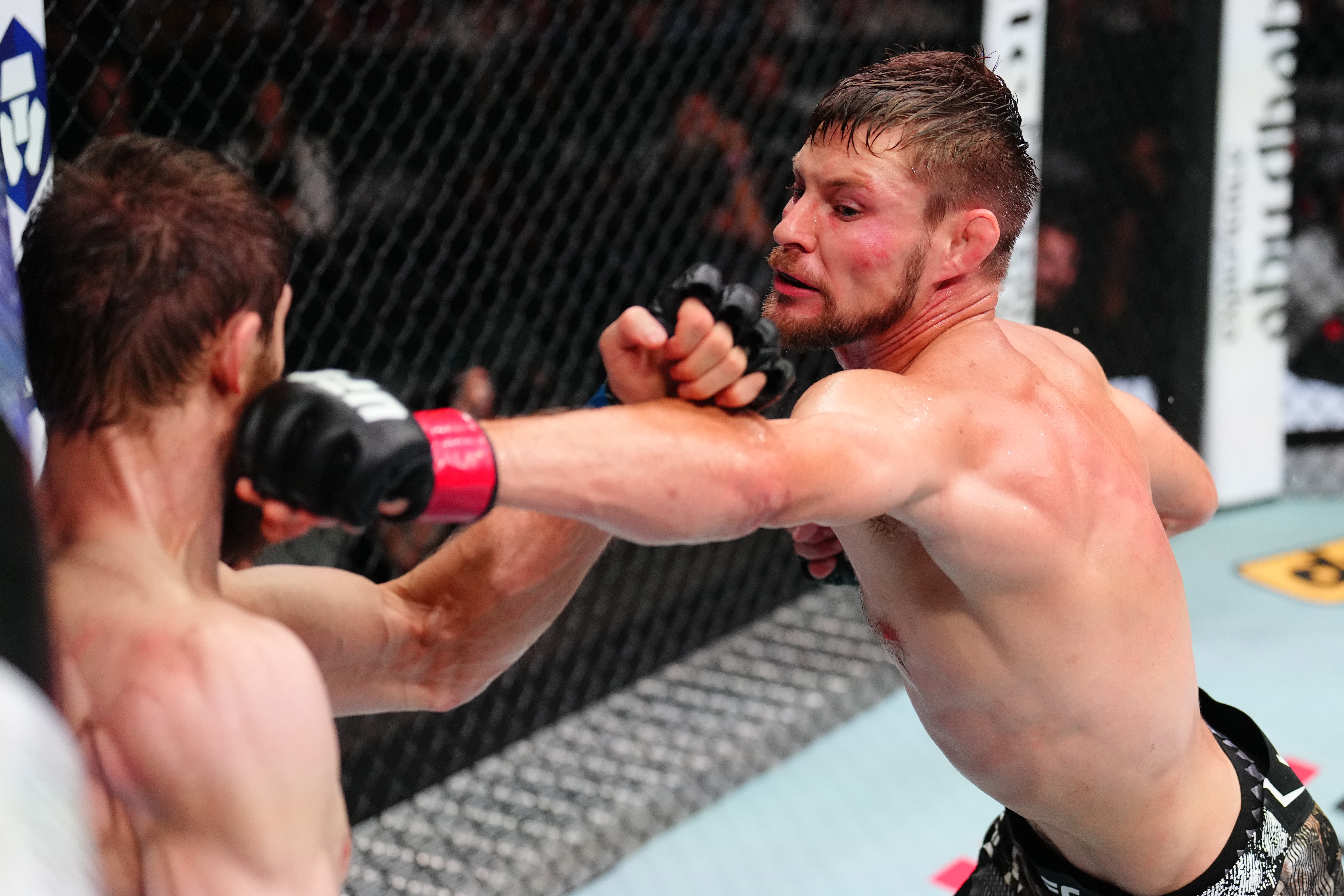 ABU DHABI, UNITED ARAB EMIRATES - JULY 26: (R-L) Bryce Mitchell punches Said Nurmagomedov of Russia in a bantamweight fight during the UFC Fight Night event at Etihad Arena on July 26, 2025 in Abu Dhabi, United Arab Emirates. (Photo by Chris Unger/Zuffa LLC)