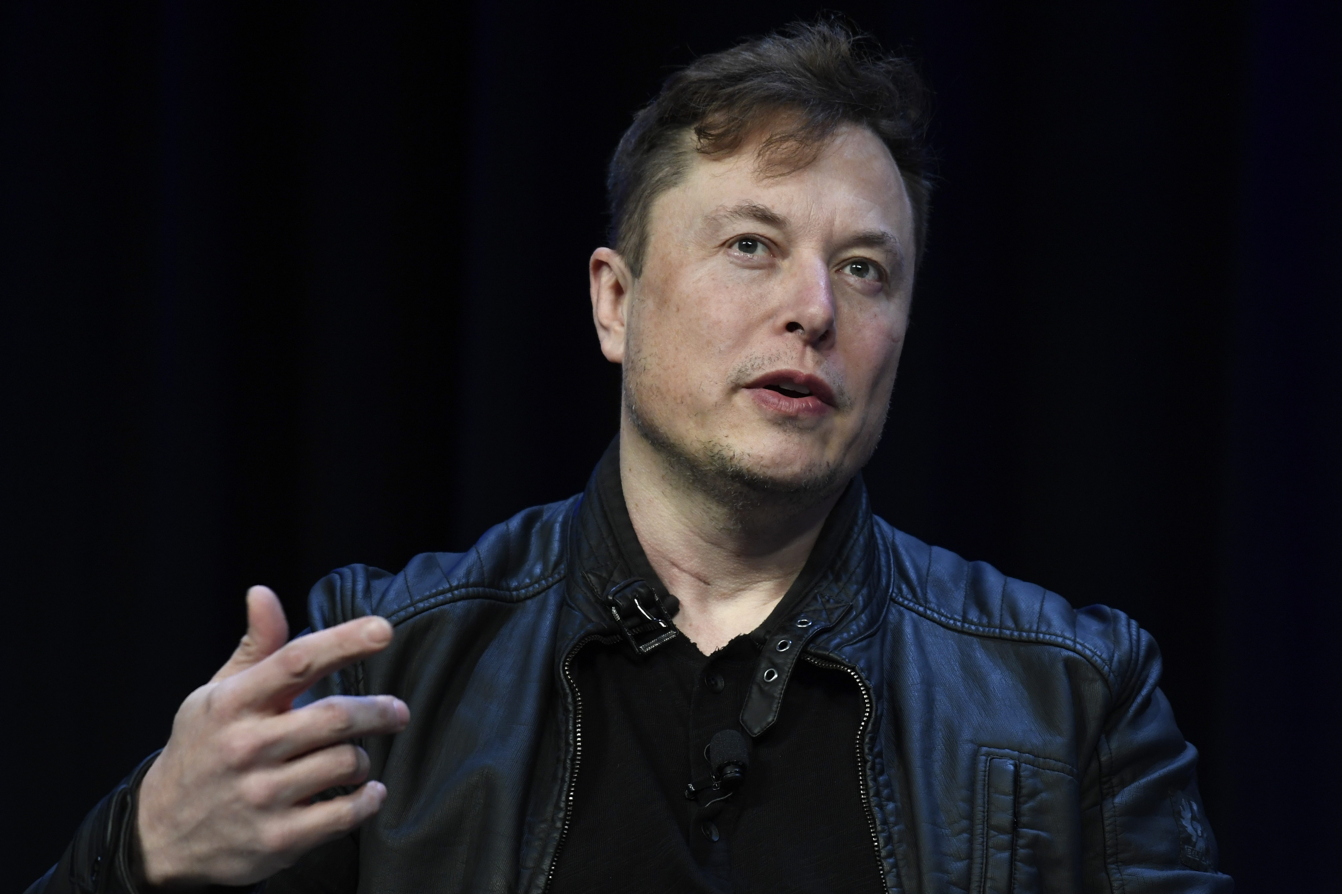 Elon Musk speaks at the 2020 Satellite Conference and Exhibition in Washington.