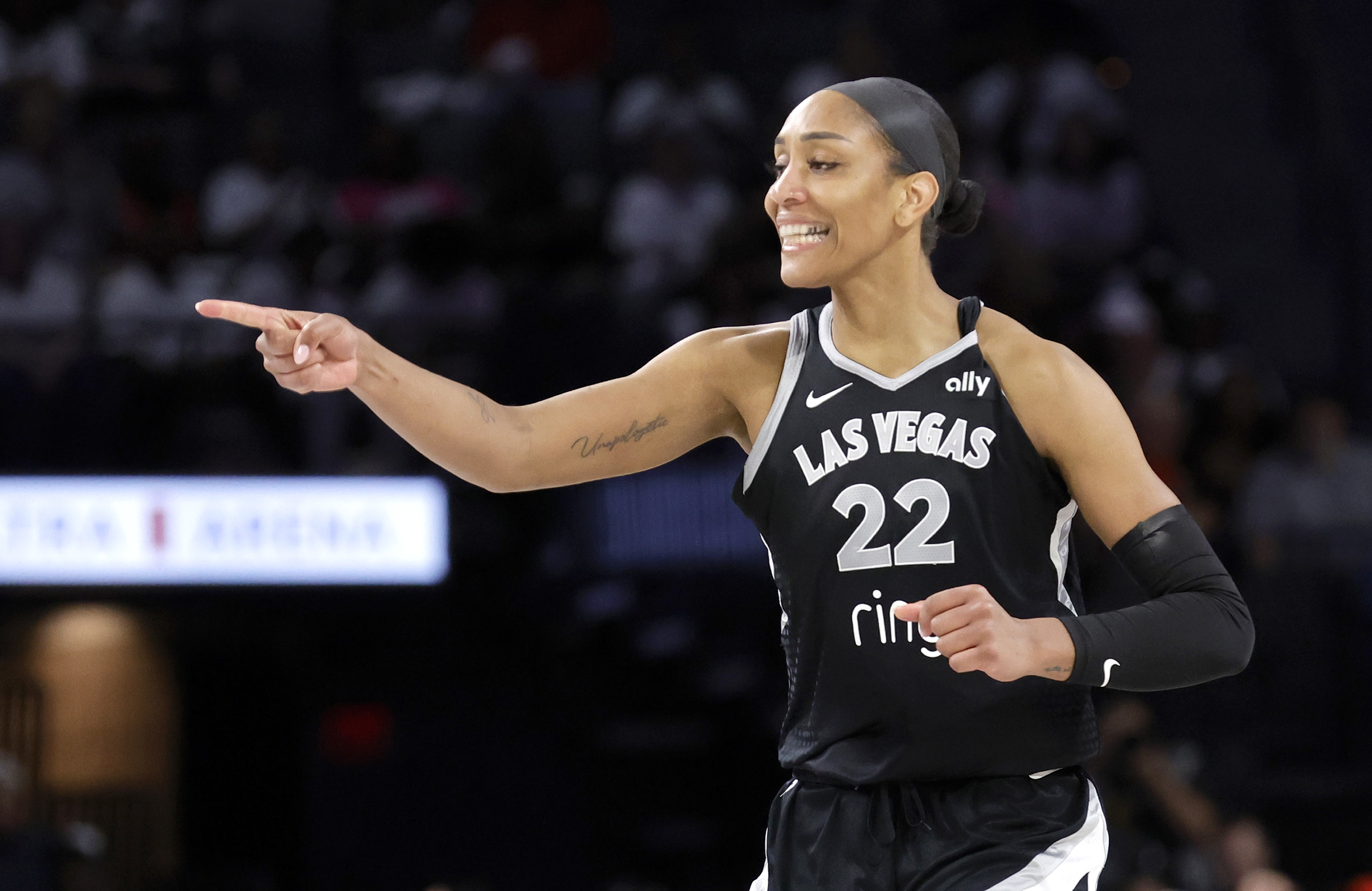 Las Vegas Aces center A'ja Wilson reacts after making a basket during the second half of Game 1 against the Seattle Storm in the first round of the WNBA basketball playoffs Sunday, Sept. 14, 2025, in Las Vegas. (AP Photo/Steve Marcus)