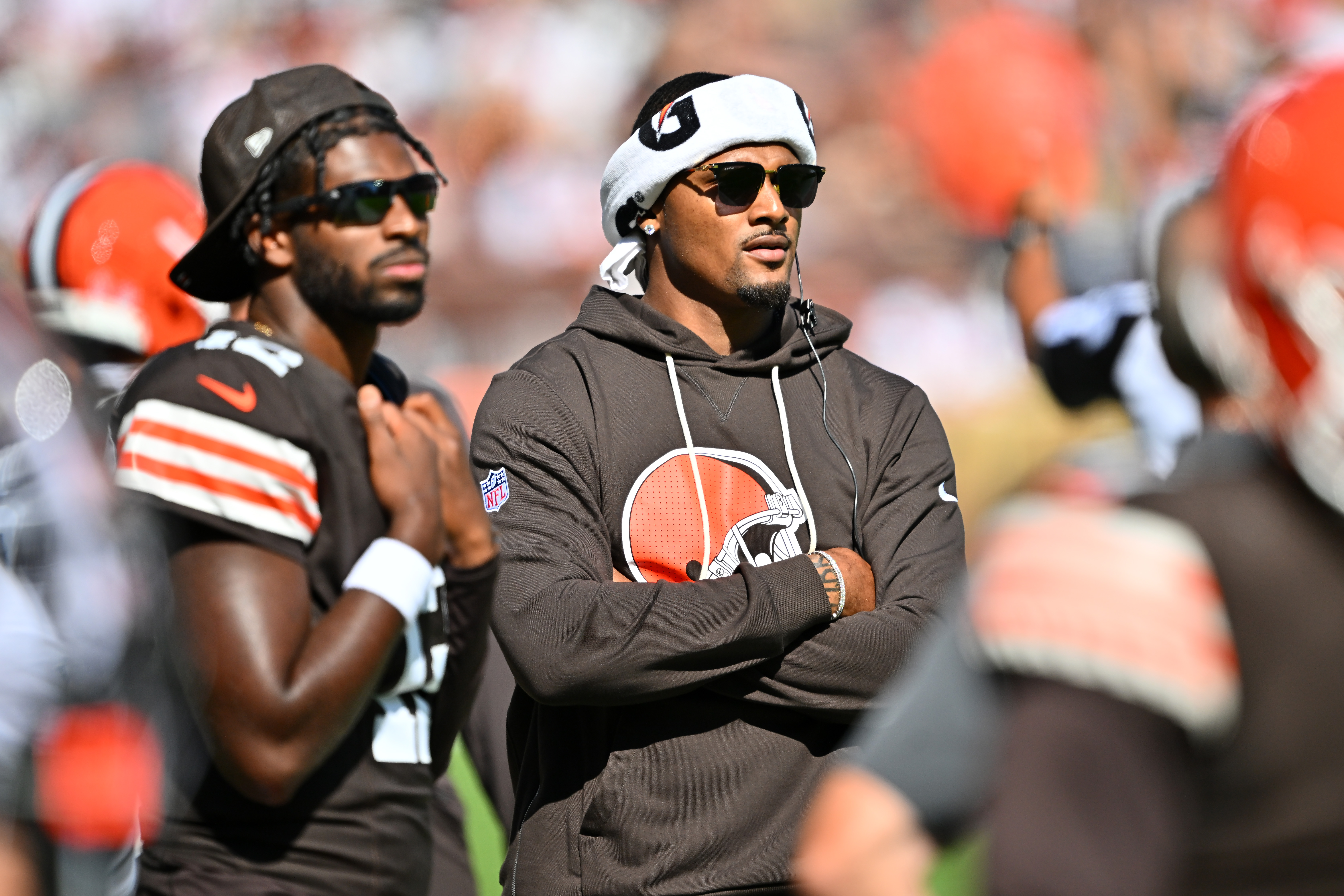 CLEVELAND, OHIO - SEPTEMBER 07: Quarterbacks Shedeur Sanders #12 and Deshaun Watson #4 of the Cleveland Browns watch from the sidelines during the fourth quarter against the Cincinnati Bengals at Huntington Bank Field on September 07, 2025 in Cleveland, Ohio. The Bengals defeated the Browns 17-16. (Photo by Jason Miller/Getty Images)