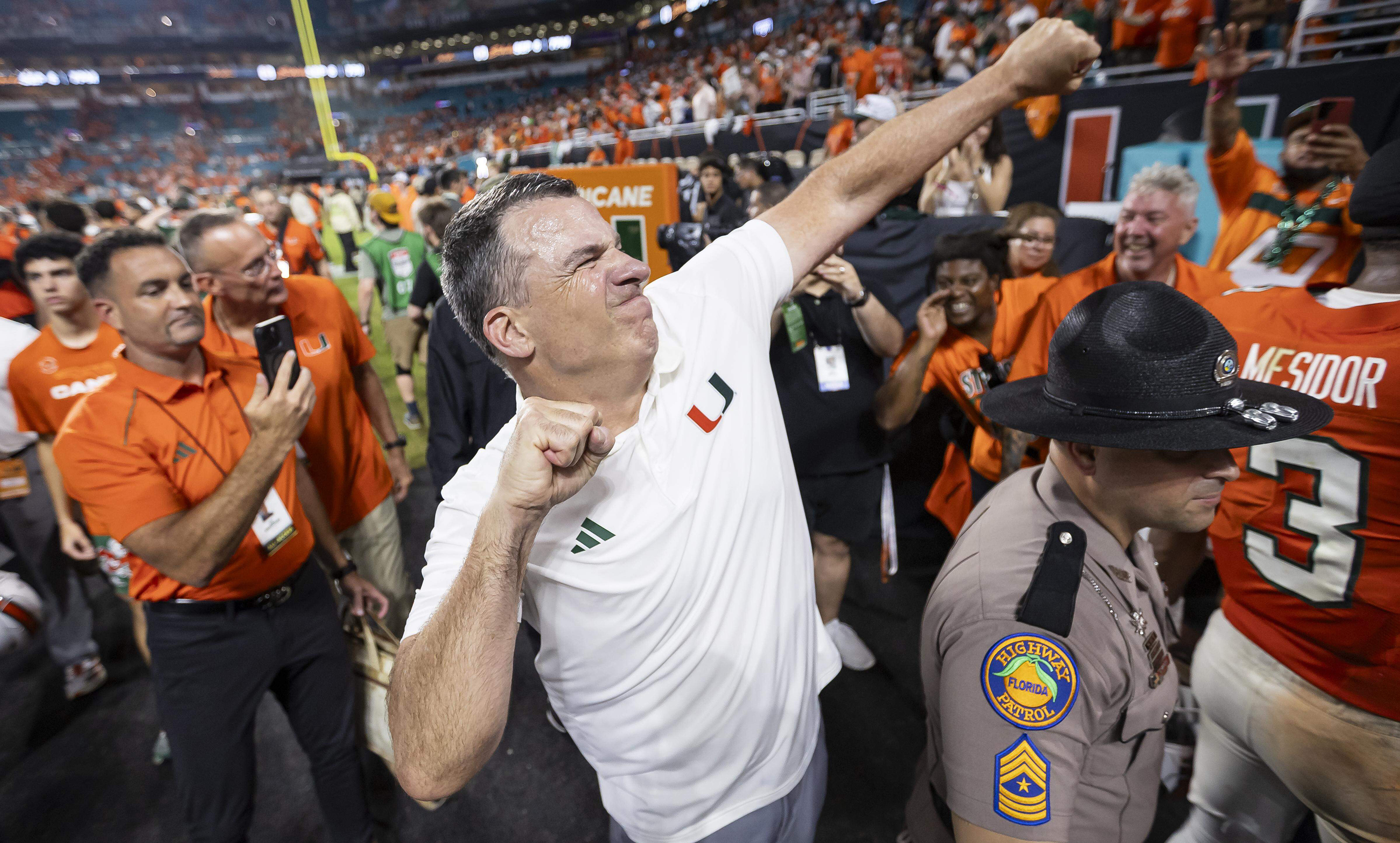 Miami Hurricanes head coach Mario Cristobal celebrates after his team defeated the Notre Dame Fighting Irish in their NCAA football game at Hard Rock Stadium on Sunday, Aug. 31, 2025, in Miami Gardens, Florida. (Matias J. Ocner/Miami Herald/Tribune News Service via Getty Images)
