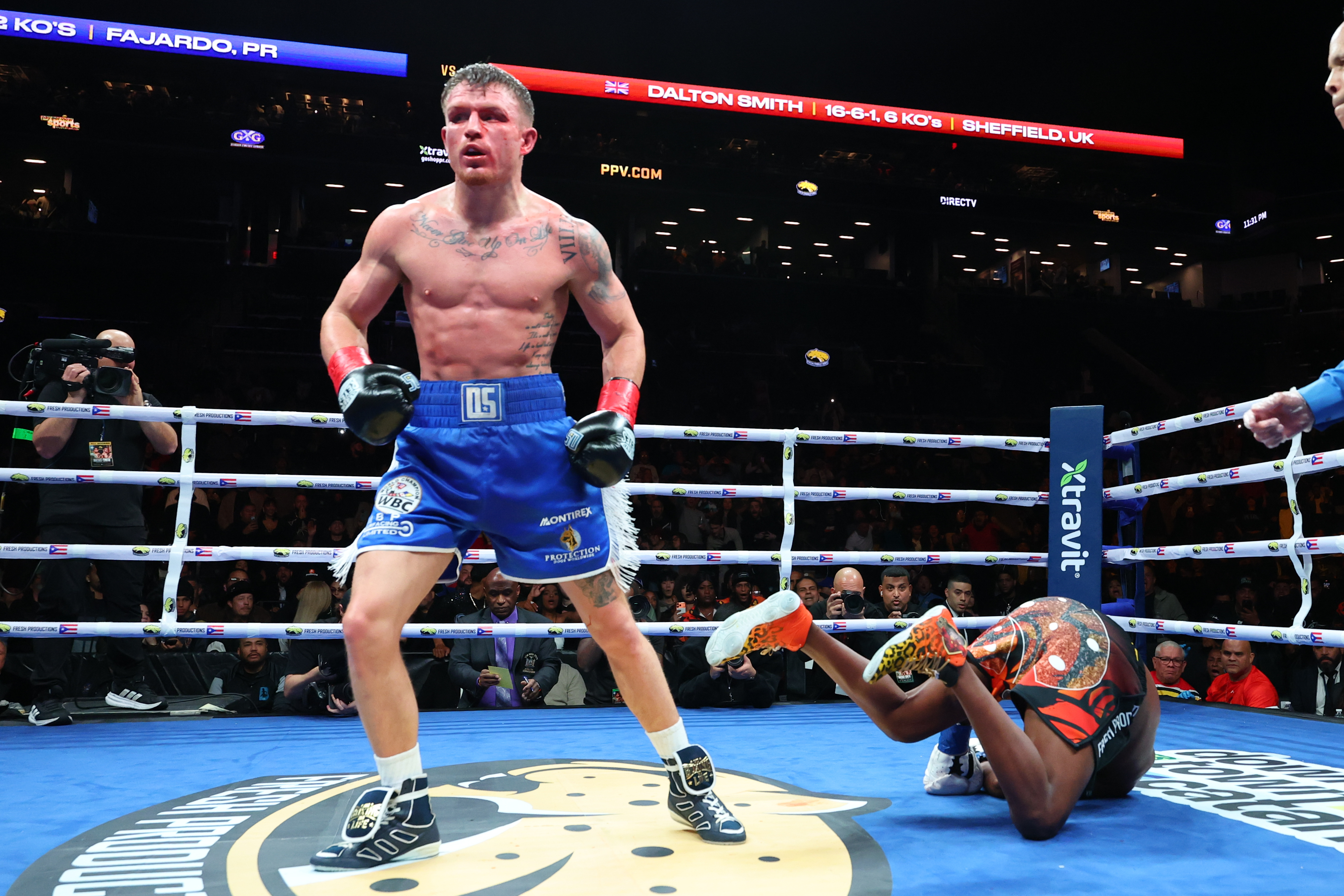 NEW YORK, NEW YORK - JANUARY 10: Subriel Matias is knocked down by Dalton Smith during their 12 round WBC super lightweight championship bout at Barclays Center on January 10, 2026 in the Brooklyn borough of New York City.  (Photo by Ed Mulholland/Getty Images)