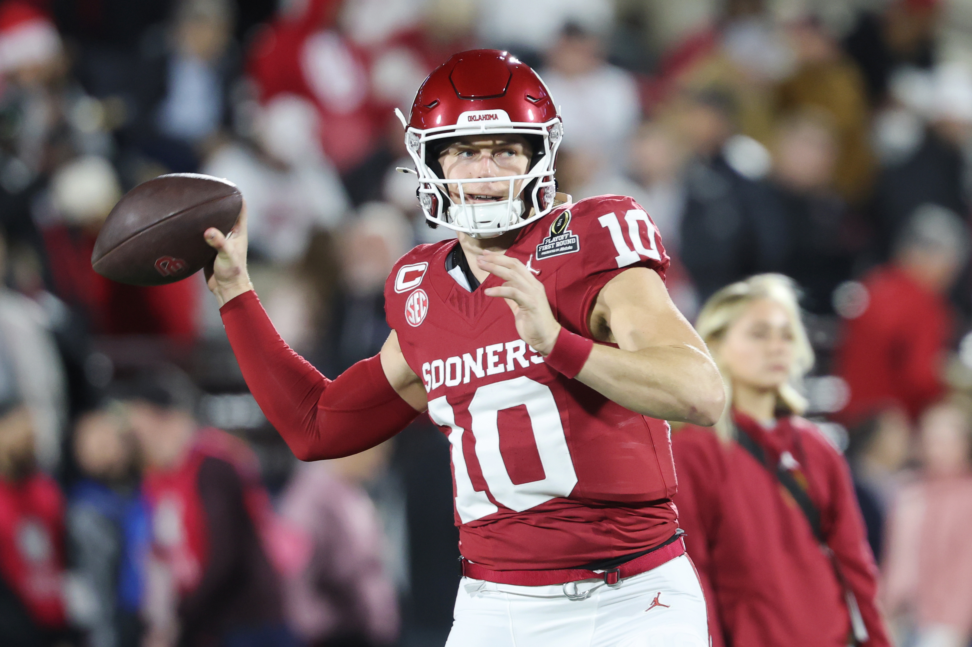 NORMAN, OKLAHOMA - DECEMBER 19: John Mateer #10 of the Oklahoma Sooners warms up prior to a game against the Alabama Crimson Tide at Gaylord Family Oklahoma Memorial Stadium on December 19, 2025 in Norman, Oklahoma. (Photo by CFP/Getty Images)