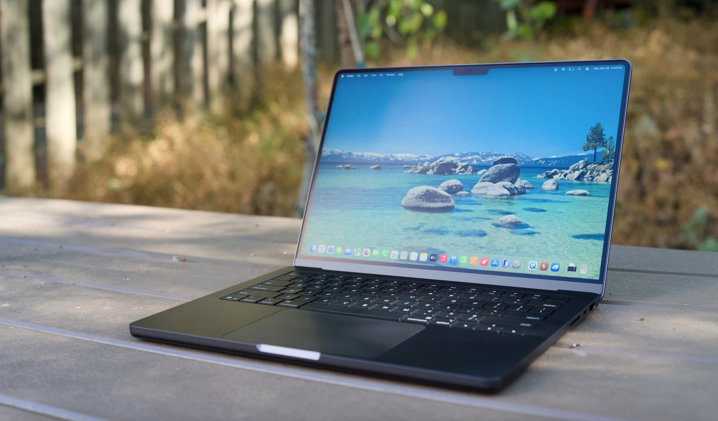 A laptop on a table. 