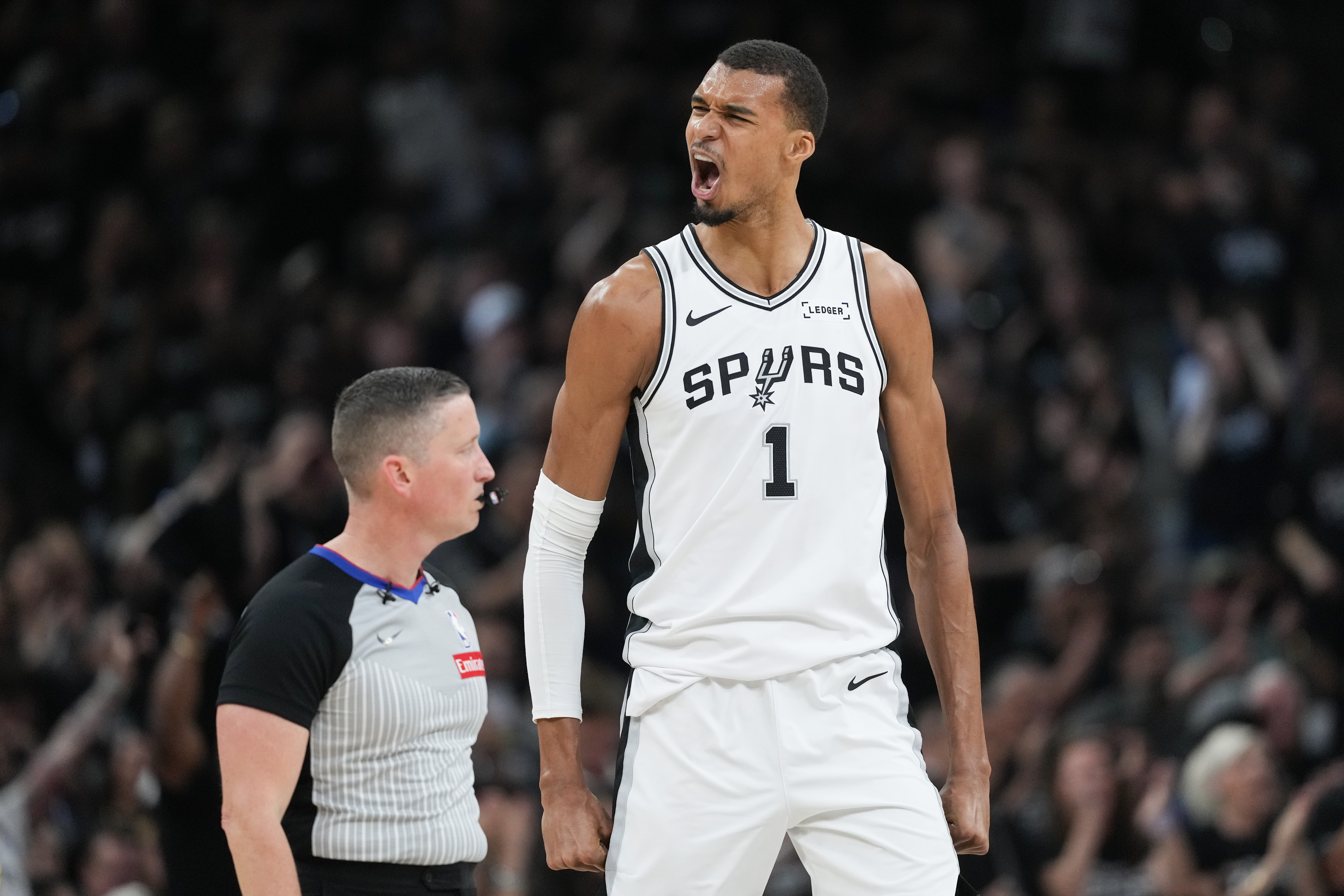 San Antonio Spurs forward/center Victor Wembanyama reacts during the first half in Game 5 of a first-round NBA playoffs basketball series against the Portland Trail Blazers, in San Antonio, Tuesday, April 28, 2026. (AP Photo/Eric Gay)