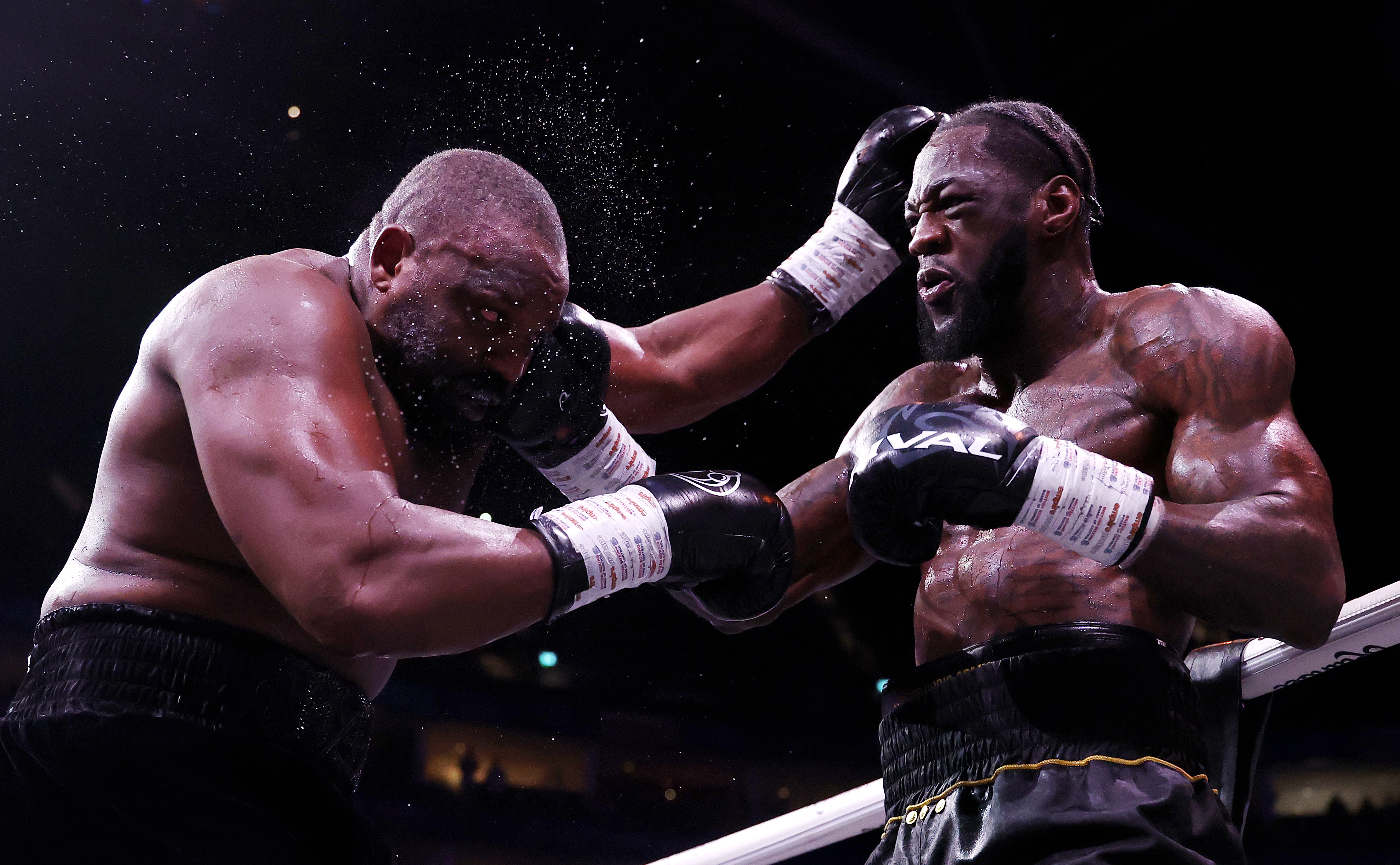 LONDON, ENGLAND - APRIL 04: Deontay Wilder punches Derek Chisora during the Heavyweight fight between Derek Chisora and Deontay Wilder as part of the Dereck Chisora v Deontay Wilder: 100 fight night at The O2 Arena on April 04, 2026 in London, England.  (Photo by Richard Pelham/Getty Images)