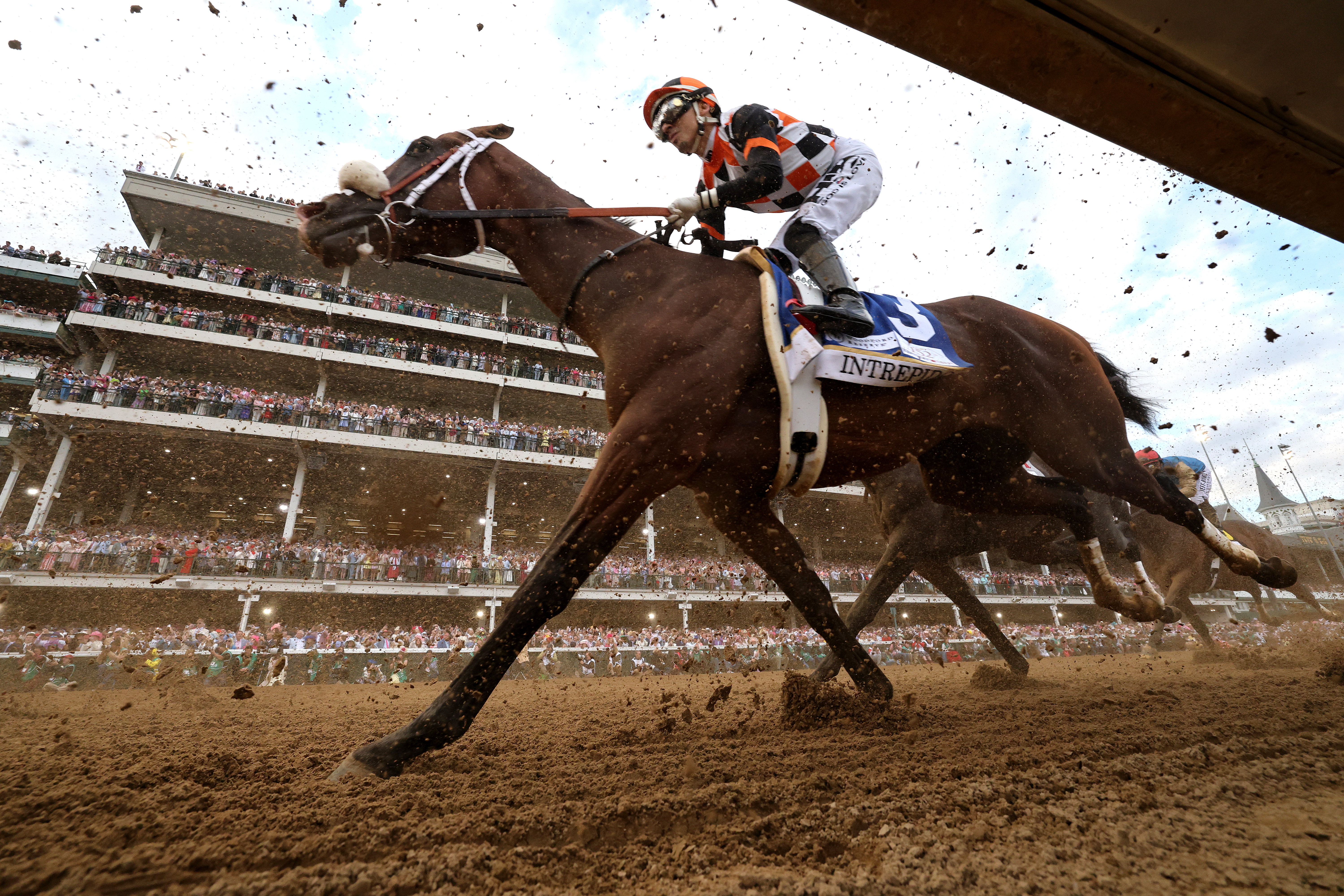 LOUISVILLE, KENTUCKY - MAY 02: Golden Tempo #19, ridden by jockey Jose Ortiz, heads to the first turn the 152nd running of the Kentucky Derby at Churchill Downs on May 02, 2026 in Louisville, Kentucky. (Photo by Michael Reaves/Getty Images)
